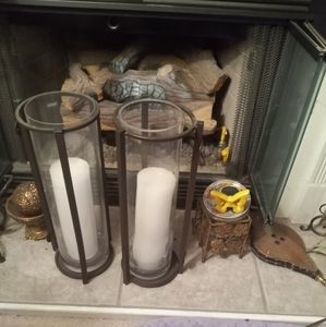 2 large candle holders with candles